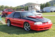 Red and Black Mustang with Drag Radials and Chrome Wheels